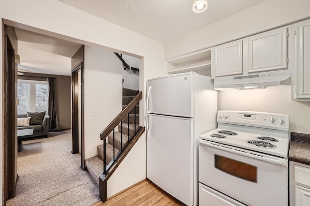 kitchen featuring white cabinetry, white appliances, ceiling fan, and light hardwood / wood-style flooring