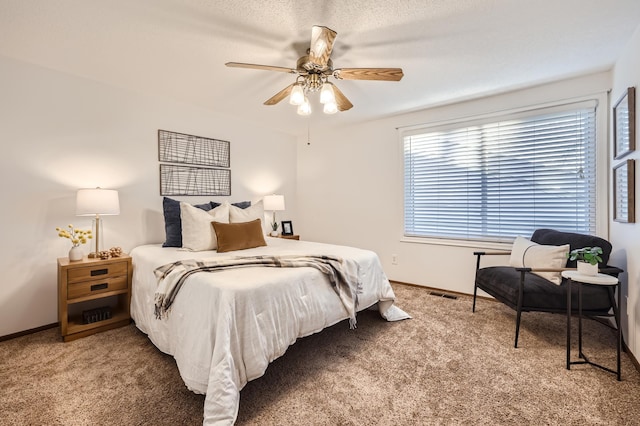 bedroom featuring ceiling fan and carpet floors