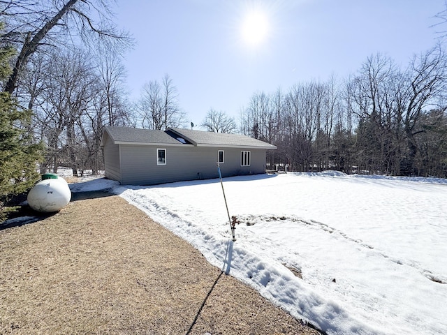 view of yard covered in snow