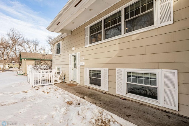 view of snow covered house