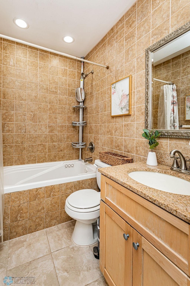 full bathroom with tile walls, tile patterned flooring, vanity, toilet, and shower / bathtub combination with curtain