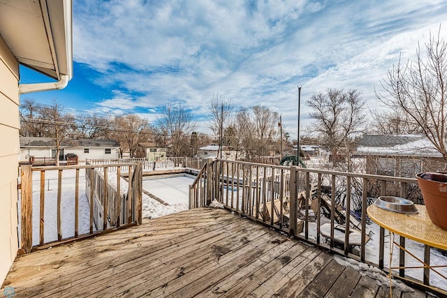 view of snow covered deck