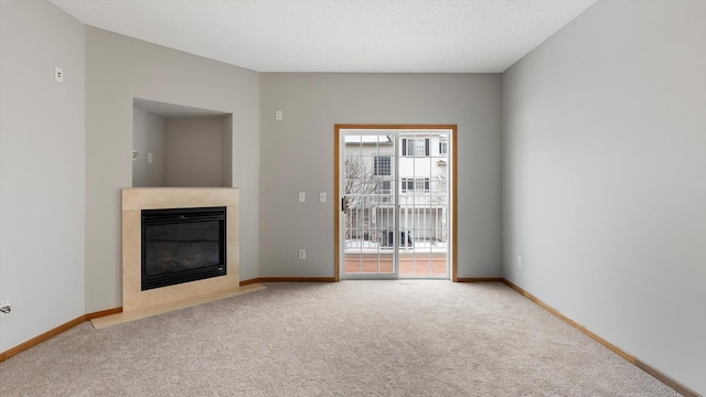 unfurnished living room with carpet floors