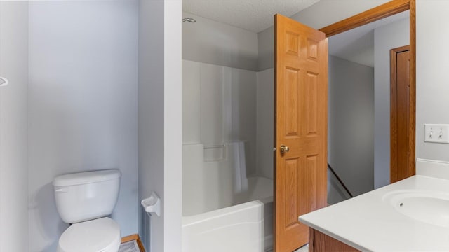 full bathroom featuring shower / tub combination, vanity, a textured ceiling, and toilet