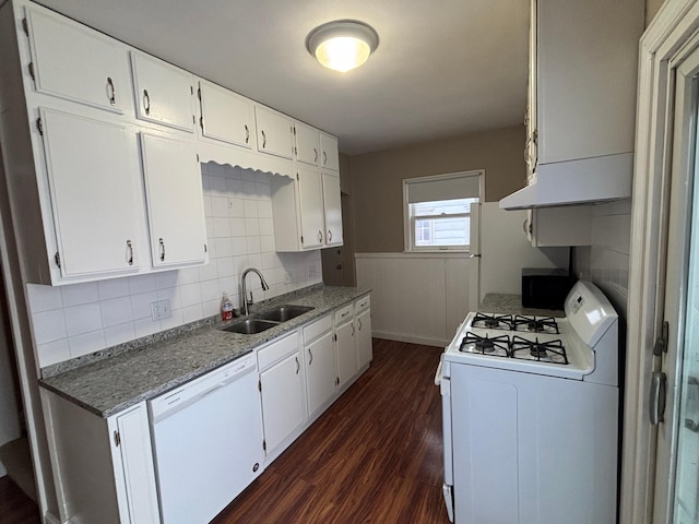 kitchen with sink, white appliances, white cabinetry, backsplash, and dark hardwood / wood-style floors