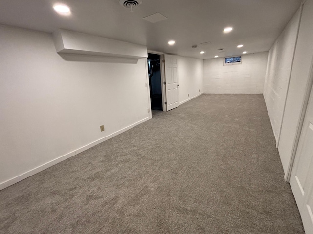 basement with dark carpet