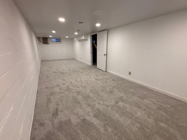 basement with light carpet