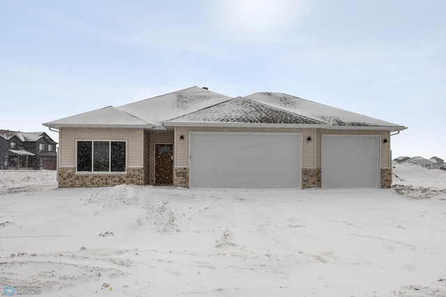 ranch-style home with a garage