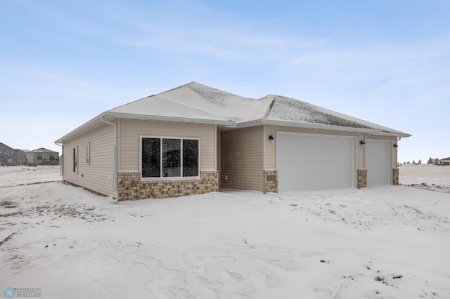 ranch-style house with a garage