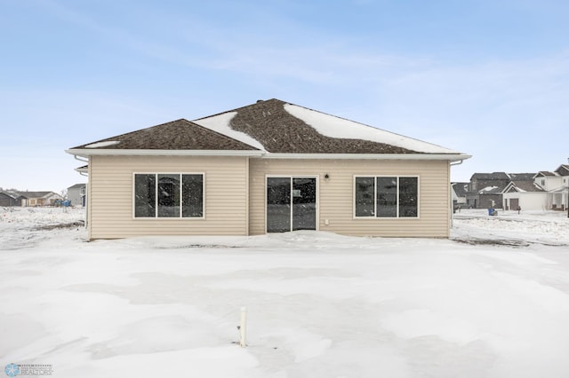 view of snow covered property