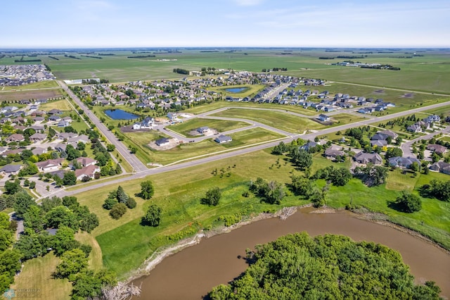 aerial view featuring a water view and a rural view