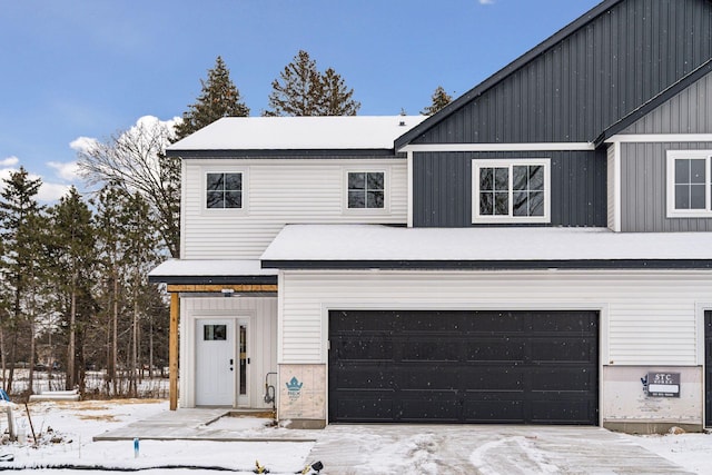 view of front of property featuring a garage