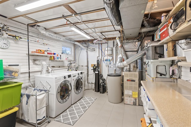 laundry room featuring separate washer and dryer