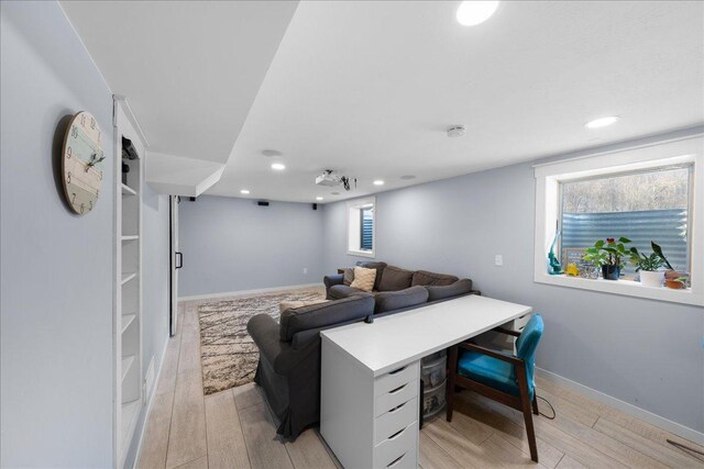 living room with light hardwood / wood-style floors