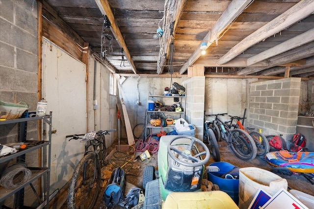 basement featuring wooden ceiling