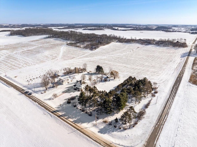 snowy aerial view with a rural view