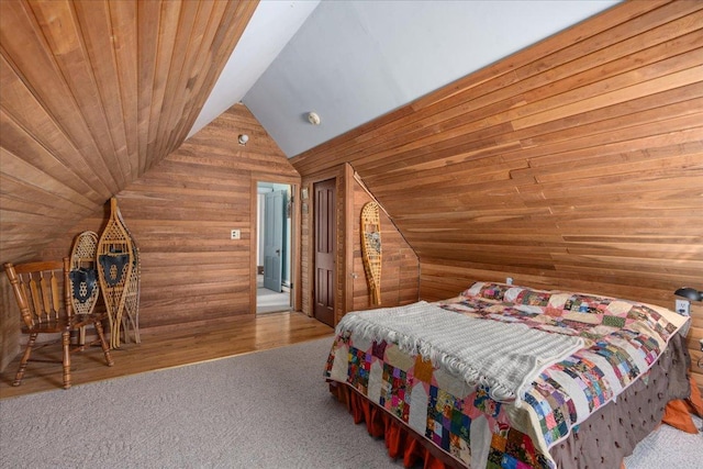 unfurnished bedroom featuring wooden ceiling, wood walls, and vaulted ceiling