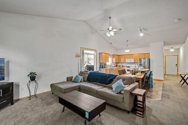 carpeted living room featuring high vaulted ceiling, a textured ceiling, and ceiling fan