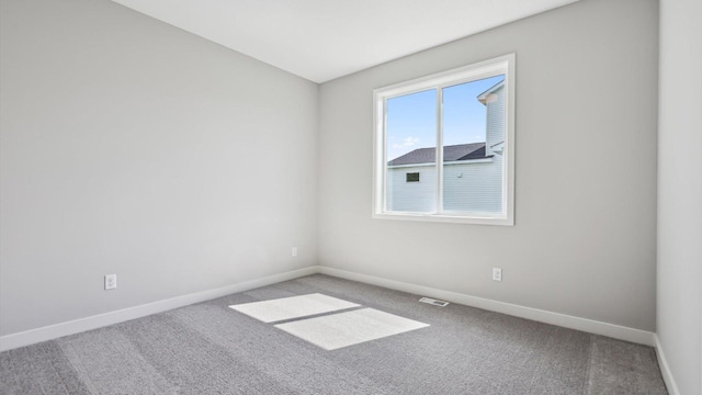 view of carpeted spare room