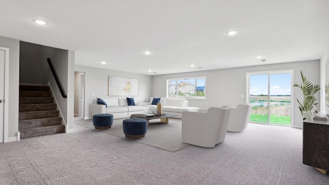 living room with light colored carpet