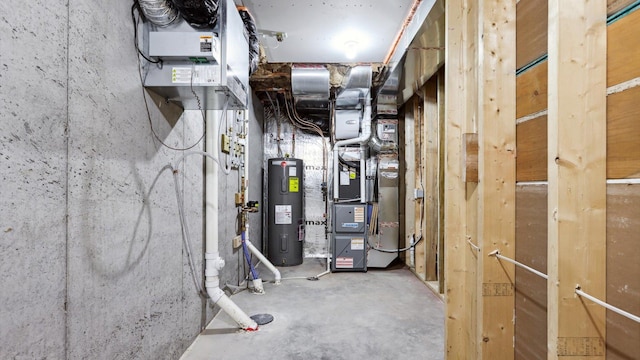 utility room featuring electric water heater and heating unit