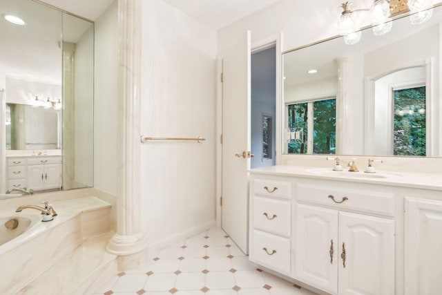 bathroom featuring vanity and a bathing tub