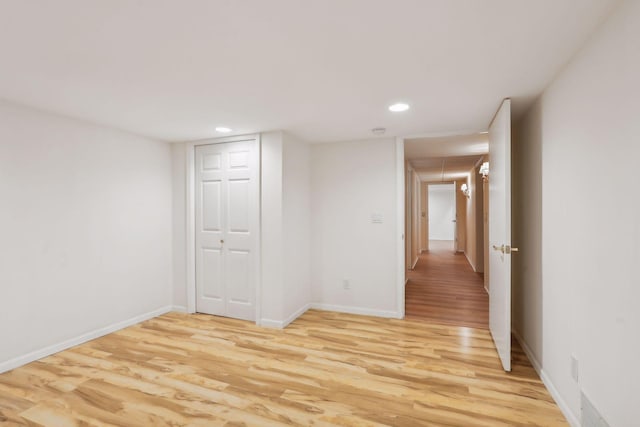 unfurnished room featuring light wood-type flooring