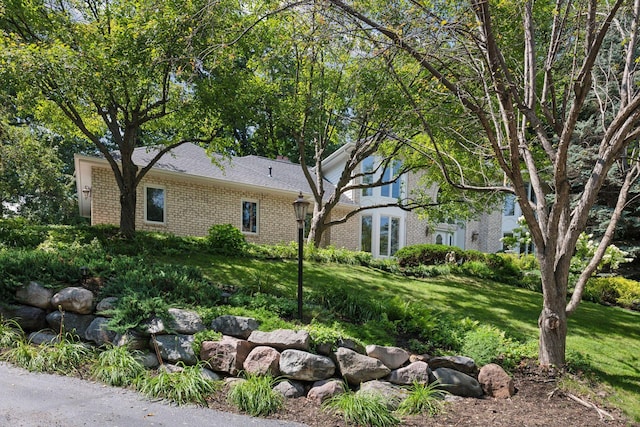 exterior space featuring a lawn