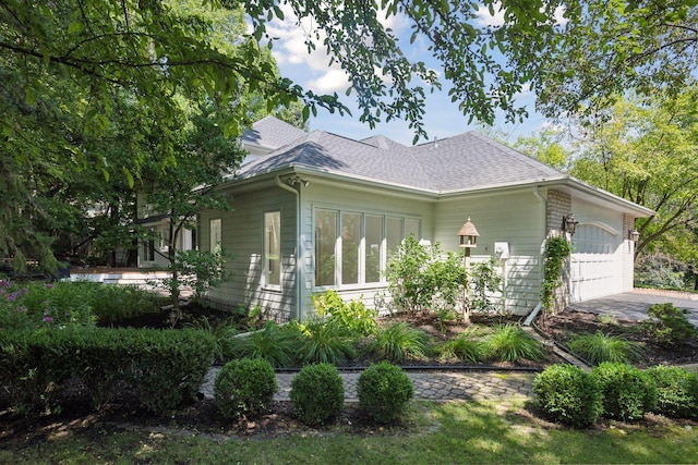 view of property exterior featuring a garage