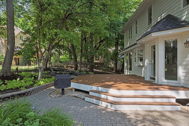 wooden deck featuring a patio