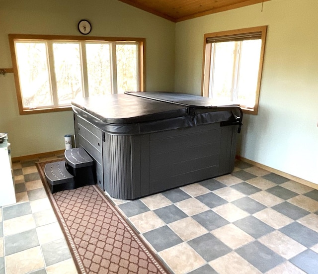 miscellaneous room featuring wood ceiling, a hot tub, and vaulted ceiling