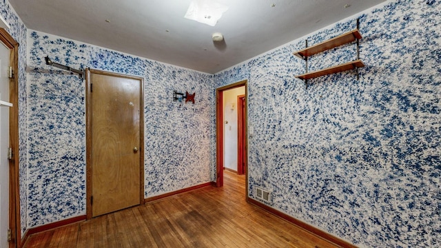 bedroom featuring hardwood / wood-style flooring