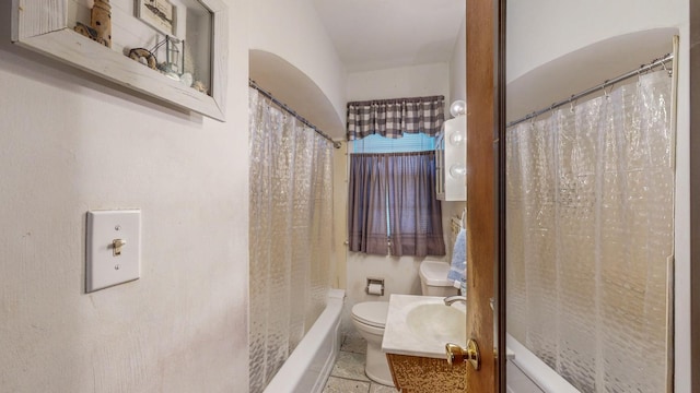 full bathroom with vanity, shower / bathtub combination with curtain, tile patterned floors, and toilet