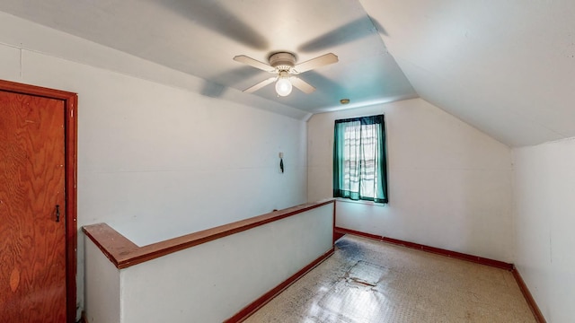 bonus room featuring lofted ceiling and ceiling fan