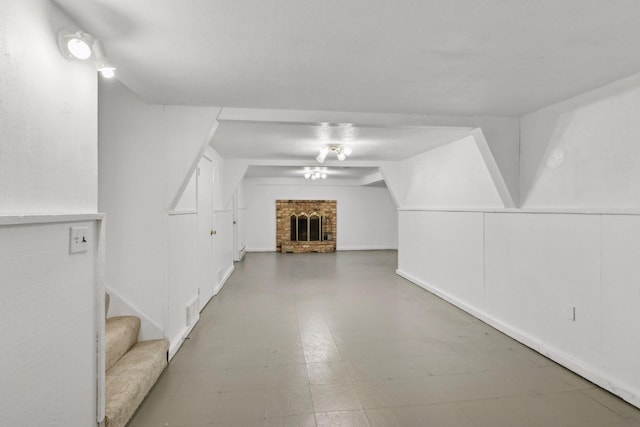 interior space featuring a brick fireplace