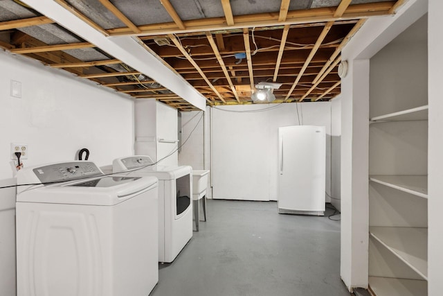 laundry area featuring independent washer and dryer