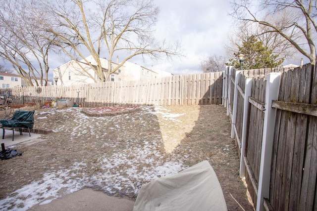 view of yard covered in snow