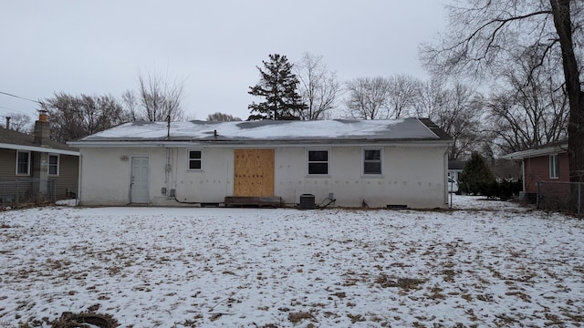 view of snow covered house