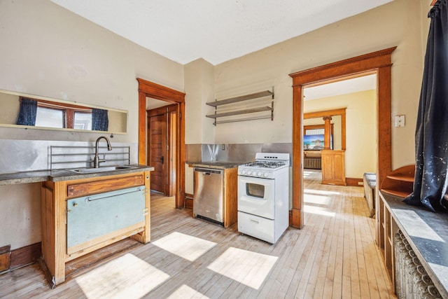 kitchen with open shelves, stainless steel dishwasher, light wood-style floors, a sink, and white gas range oven