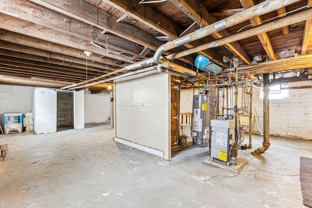 basement with a heating unit and gas water heater