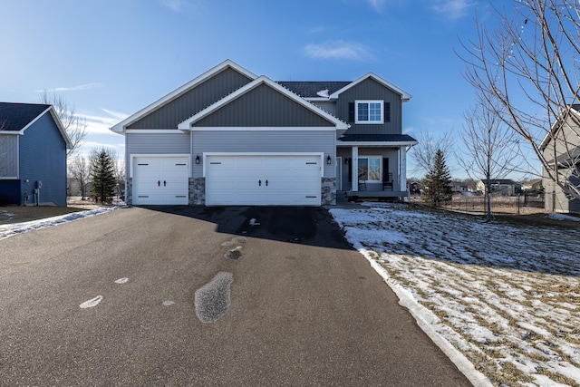 view of front of property featuring a garage