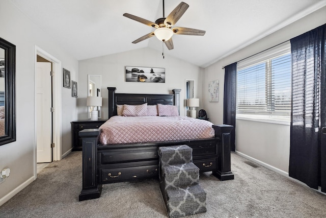 bedroom featuring lofted ceiling, carpet floors, and ceiling fan