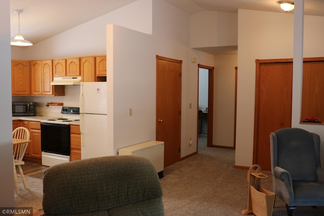 kitchen featuring vaulted ceiling, light brown cabinetry, hanging light fixtures, light colored carpet, and white appliances