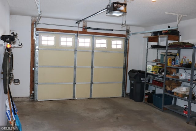 garage featuring a garage door opener