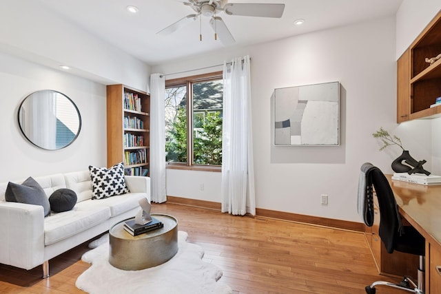 interior space with recessed lighting, light wood-type flooring, baseboards, and a ceiling fan