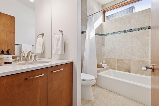 full bathroom with vanity, toilet, tile patterned flooring, and shower / tub combo with curtain