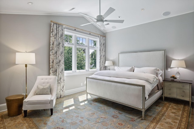 bedroom featuring crown molding, ceiling fan, lofted ceiling, and multiple windows