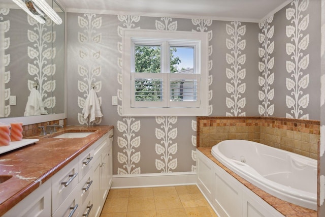 bathroom with ornamental molding, tile patterned flooring, vanity, and a washtub