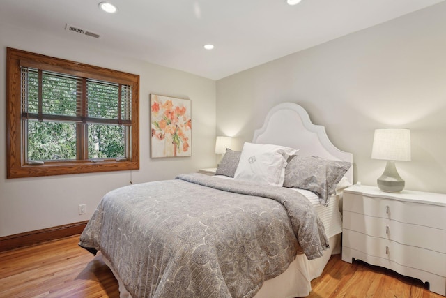 bedroom featuring light wood-type flooring