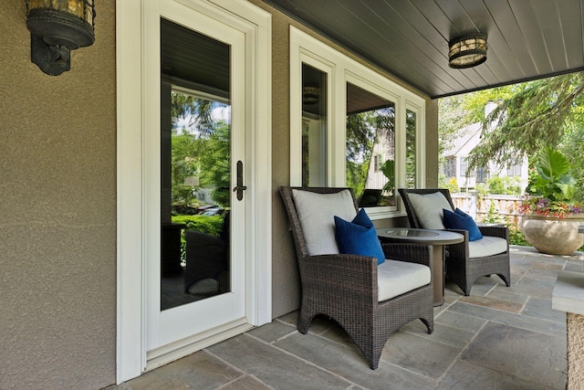 sunroom with wooden ceiling